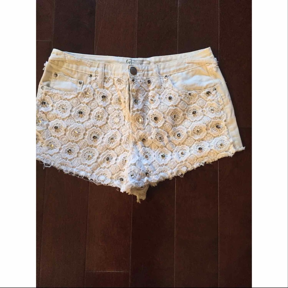 Free People white embellished denim shorts